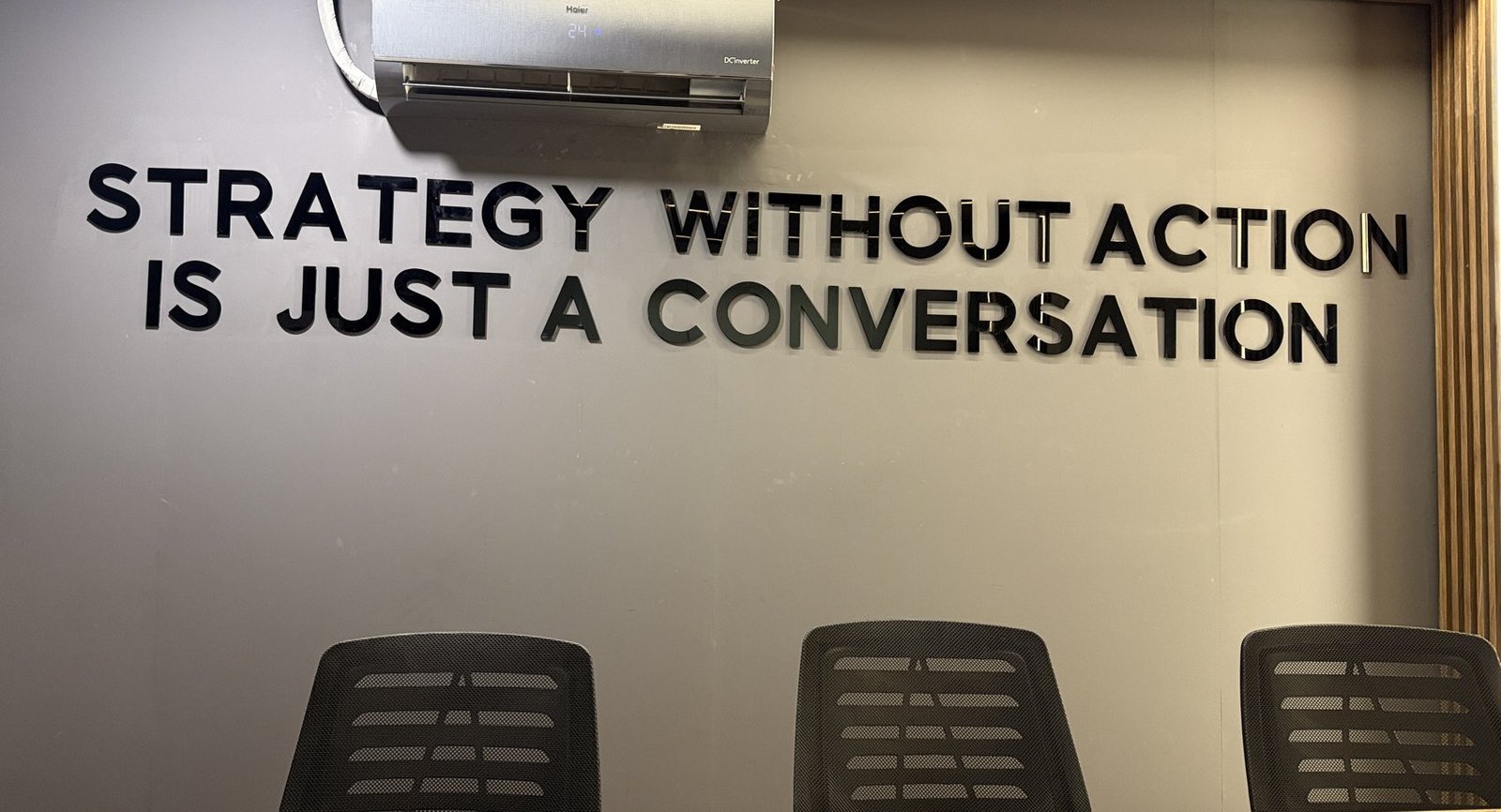 Strategy without action is just a conversation, on the wall at the Workerz office